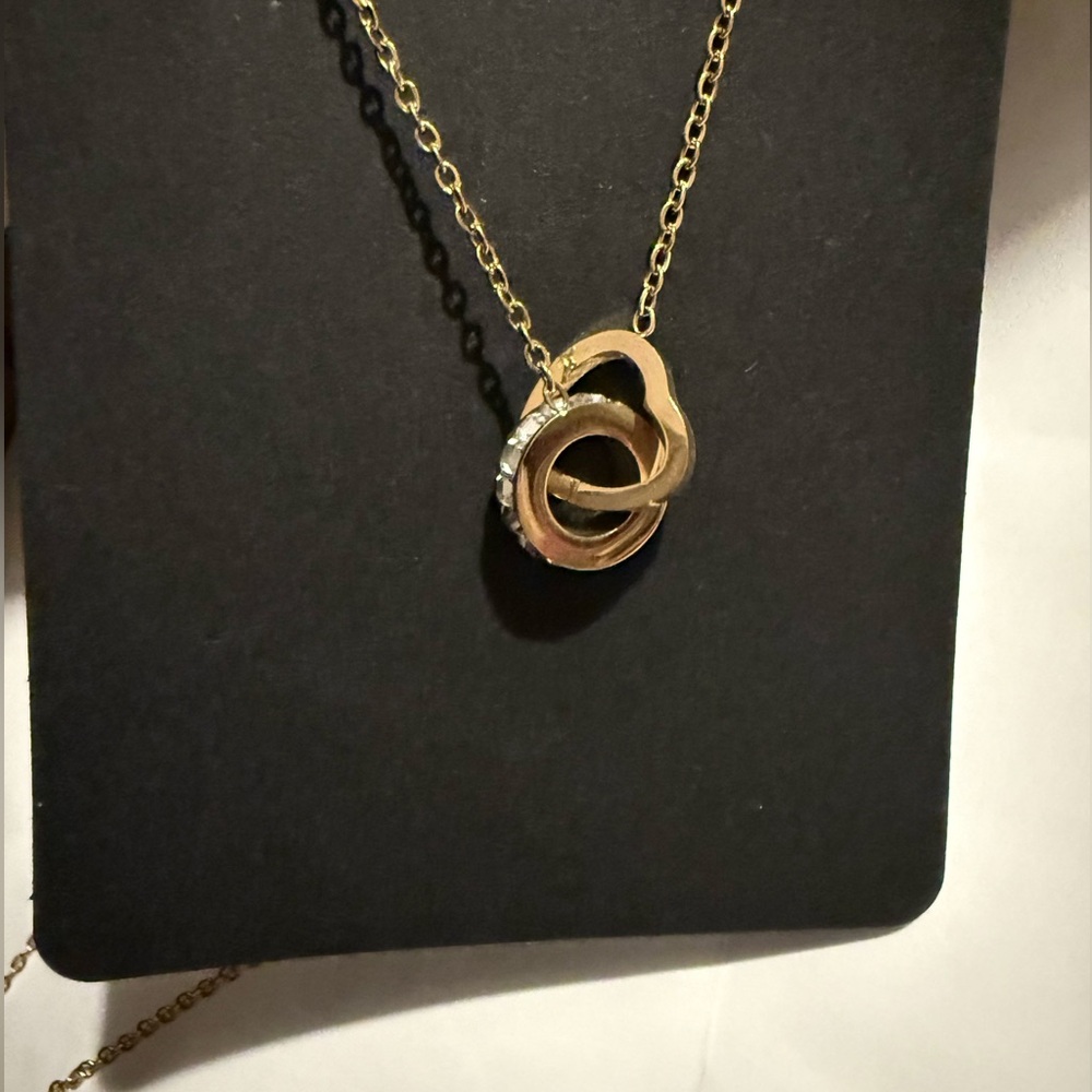 interlocking heart and circle necklace, gold plated stainless steel and cz